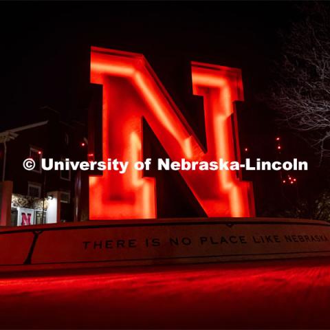 The N Sculpture and steps in front of Wick Alumni Center are lit with red lights for the Glow Big Red event. February 14, 2024. Photo by Kristen Labadie / University Communication.